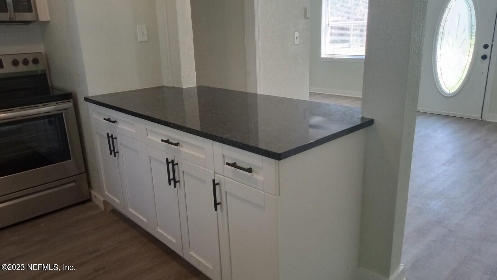 8916 Ricardo Lane Jacksonville, FL 32216 - Photo 24 of 33 Kitchen island
