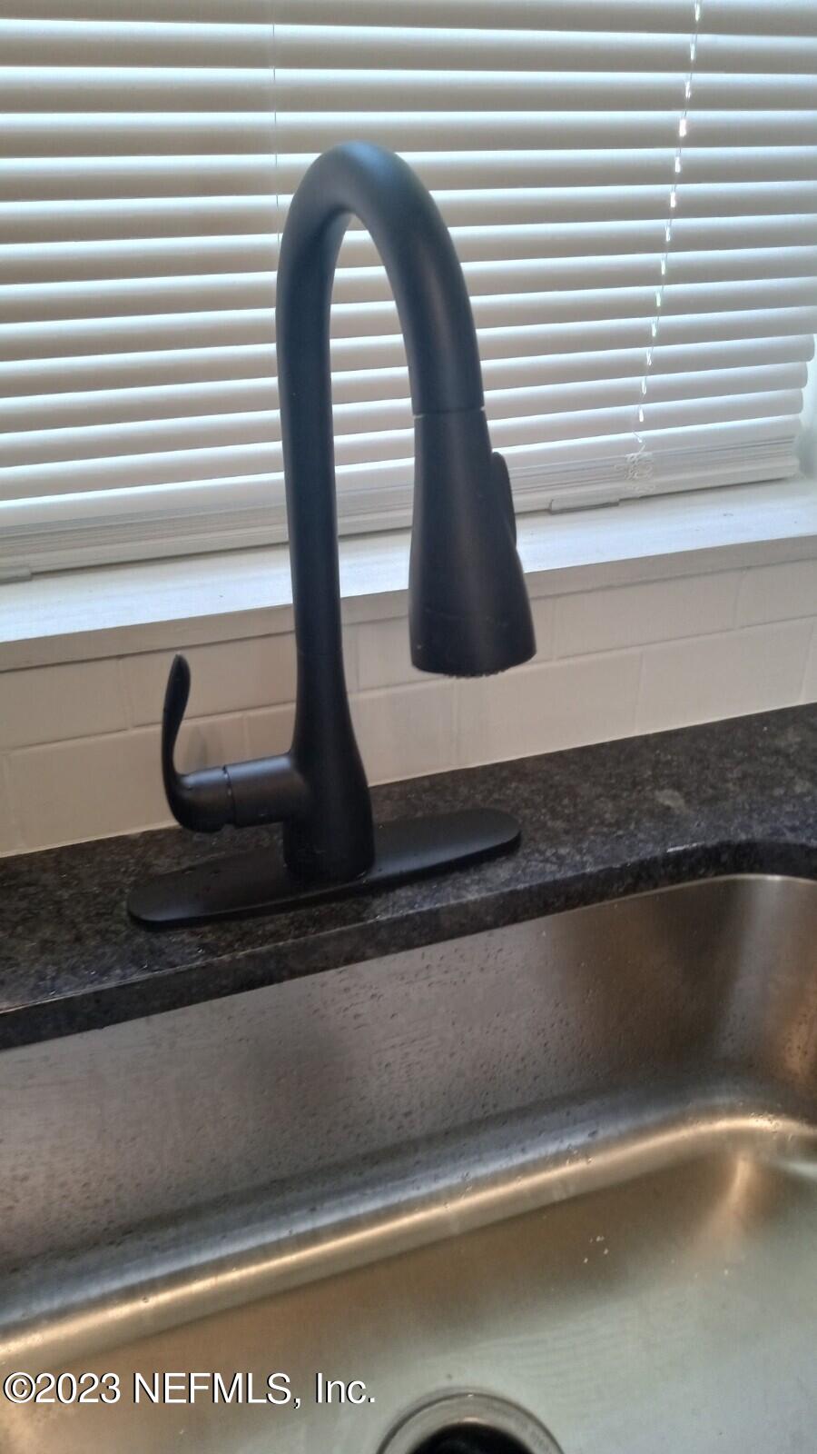 8916 Ricardo Lane Jacksonville, FL 32216 - Photo 25 of 33 Kitchen faucet