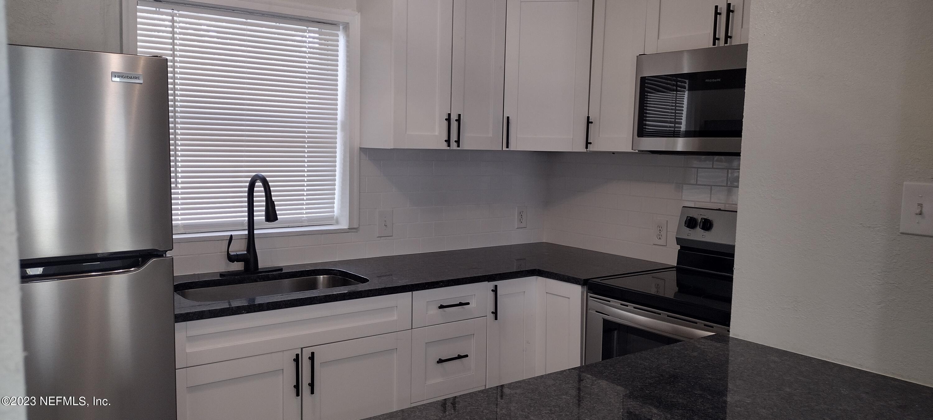 8916 Ricardo Lane Jacksonville, FL 32216 - Photo 3 of 33 Kitchen Main view angled