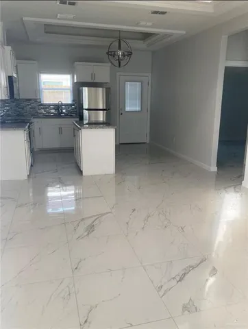 an empty room with an entryway