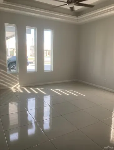 a white toilet sitting next to a white sink