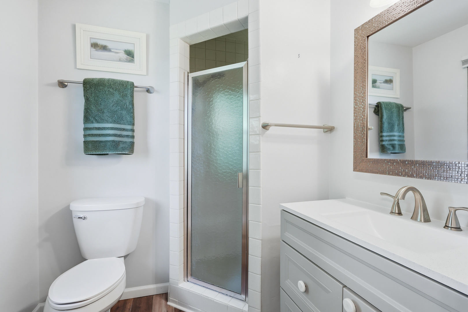 4314 Spring Street Davenport, IA 52807 - Photo 32 of 51 a bathroom with a toilet sink and mirror