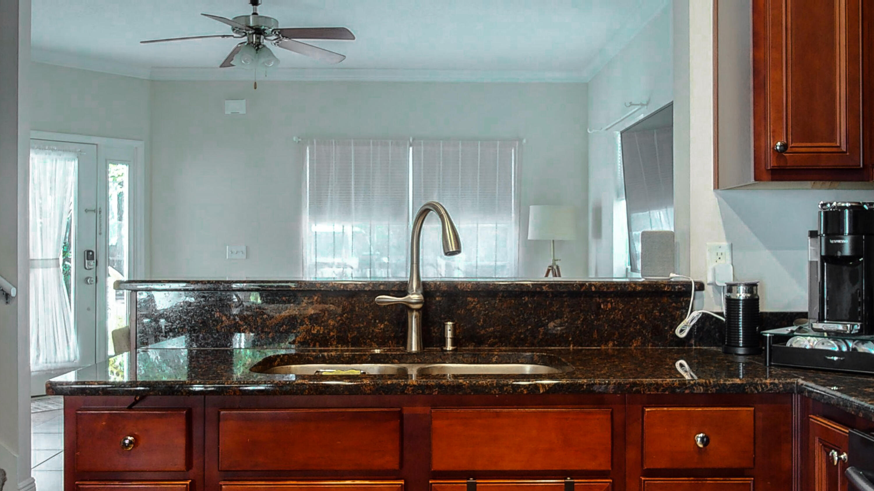 23 Beacon Point Drive Santa Rosa Beach, FL 32459 - Photo 11 of 33 a kitchen with a sink and cabinets