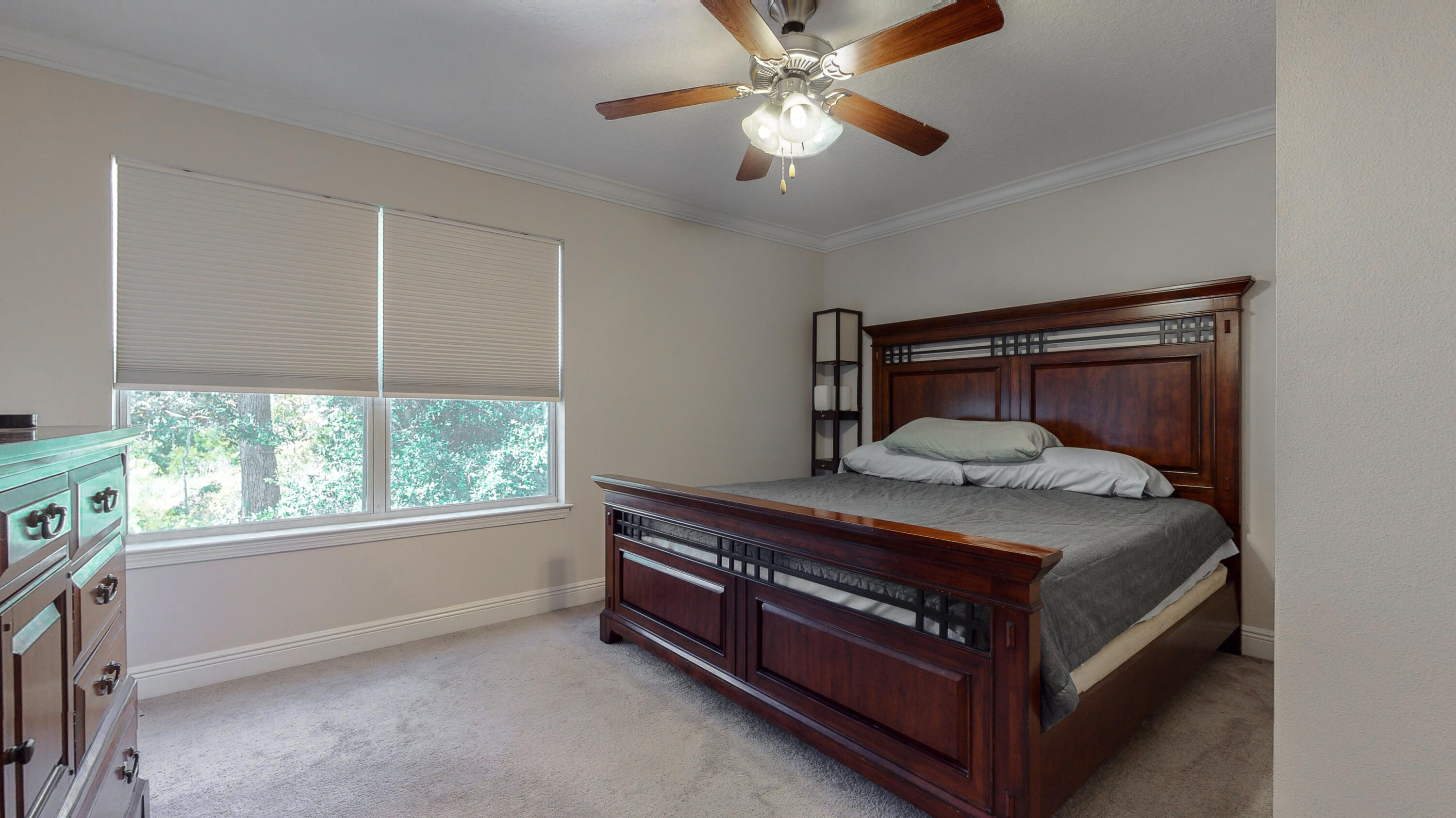 23 Beacon Point Drive Santa Rosa Beach, FL 32459 - Photo 13 of 33 a bed sitting in a bedroom next to a window