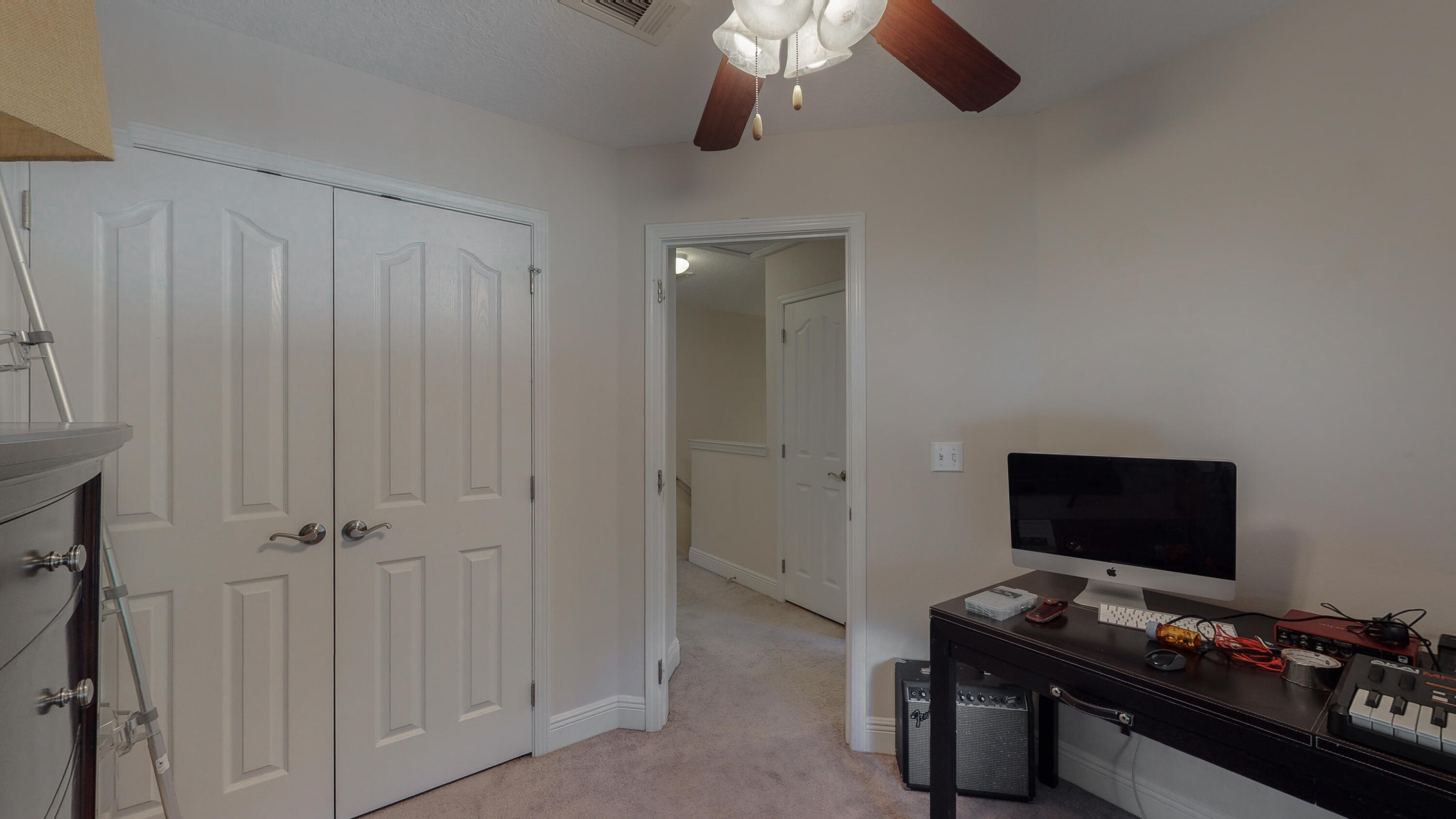 23 Beacon Point Drive Santa Rosa Beach, FL 32459 - Photo 20 of 33 a bedroom with a bed and a tv