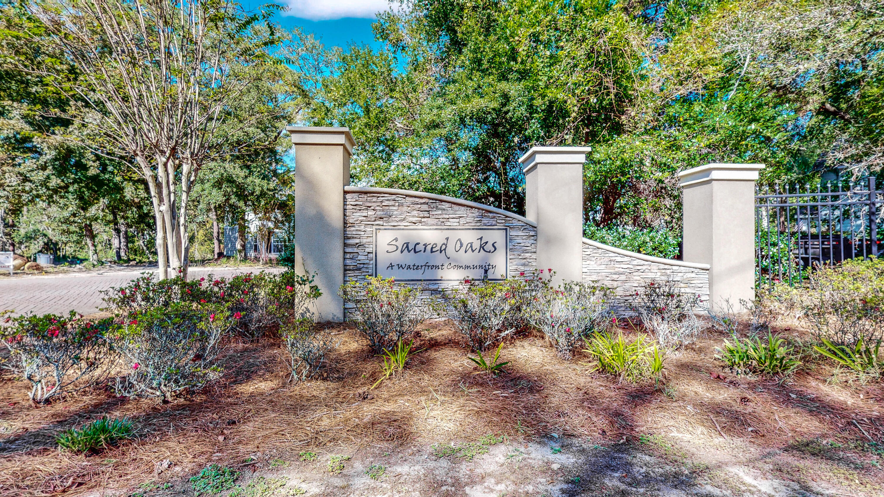 23 Beacon Point Drive Santa Rosa Beach, FL 32459 - Photo 2 of 33 a street sign on a sidewalk next to a road