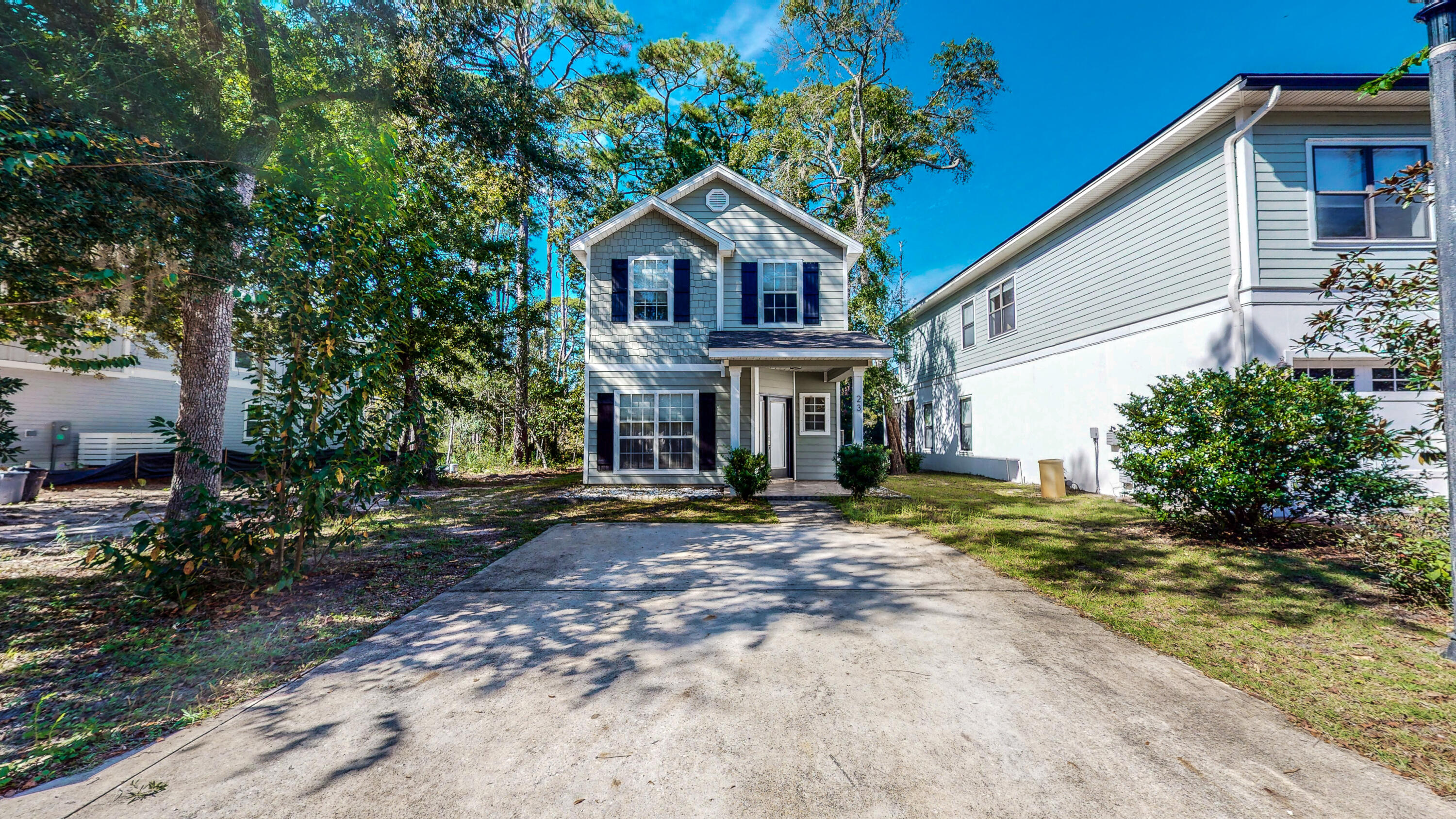 23 Beacon Point Drive Santa Rosa Beach, FL 32459 - Photo 28 of 33 a front view of a house with garden