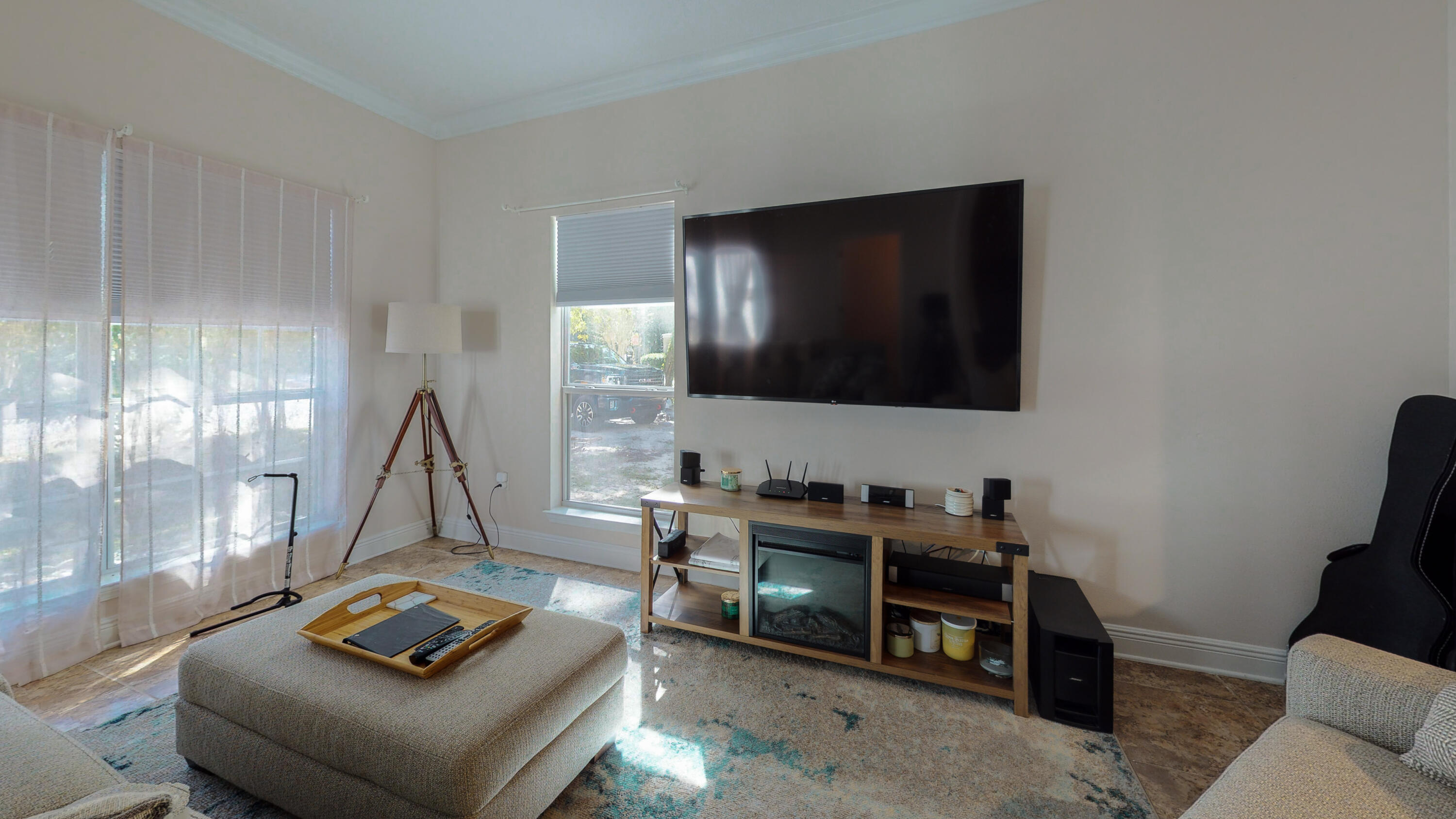 23 Beacon Point Drive Santa Rosa Beach, FL 32459 - Photo 6 of 33 a living room with furniture and a flat screen tv