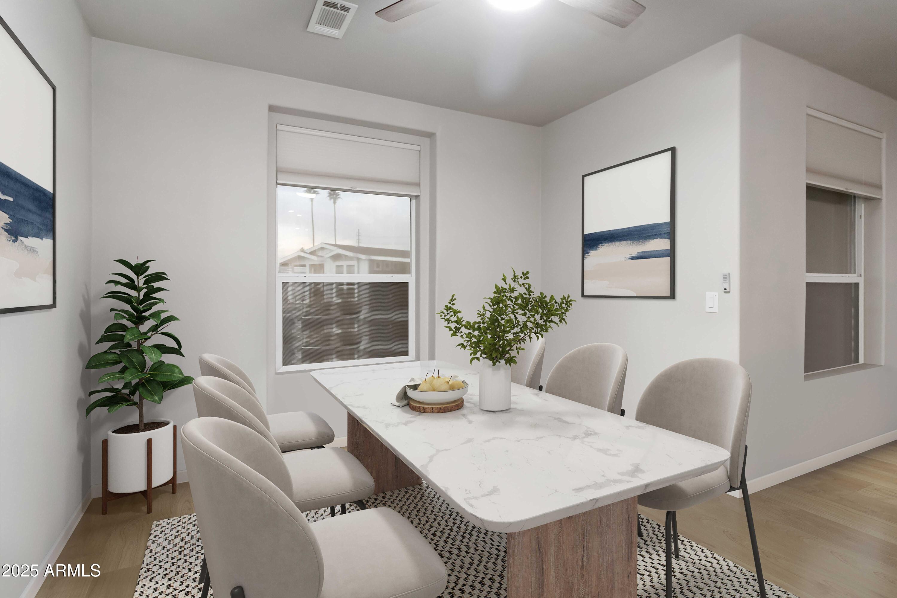 2727 East University Drive, Unit 146 Tempe, AZ 85288 - Photo 11 of 36 a dining room with furniture and window