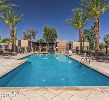 2727 East University Drive, Unit 146 Tempe, AZ 85288 - Photo 26 of 36 a swimming pool view with a outdoor seating space