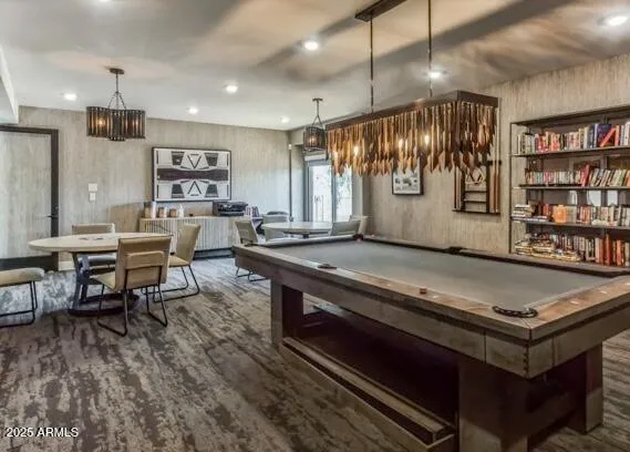 a open kitchen with stainless steel appliances granite countertop a stove and a refrigerator