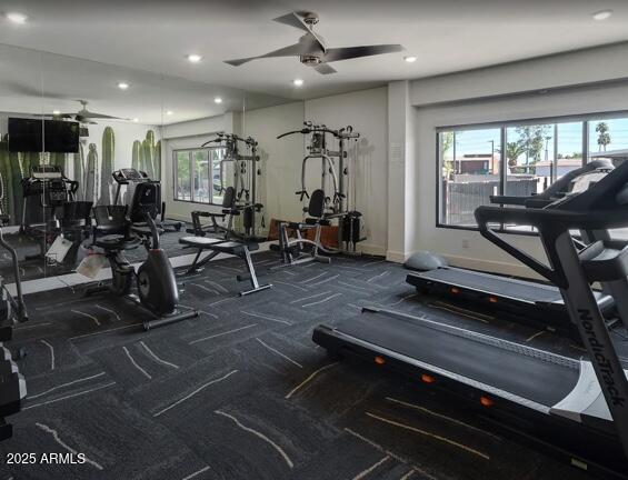 2727 East University Drive, Unit 146 Tempe, AZ 85288 - Photo 31 of 36 a living room with lots of furniture and a large window