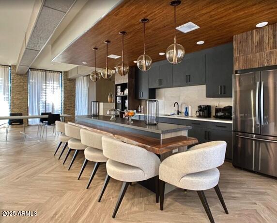 2727 East University Drive, Unit 146 Tempe, AZ 85288 - Photo 32 of 36 a kitchen with a dining table chairs and refrigerator