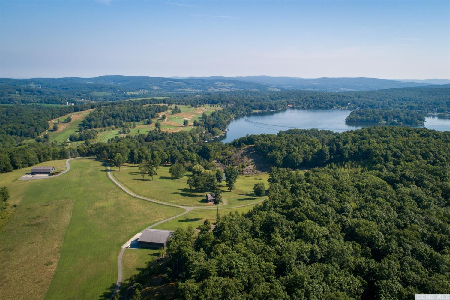 181 Golf Course Road Hillsdale, NY 12529 - Photo 34 of 44 a view of a lake in middle of the town