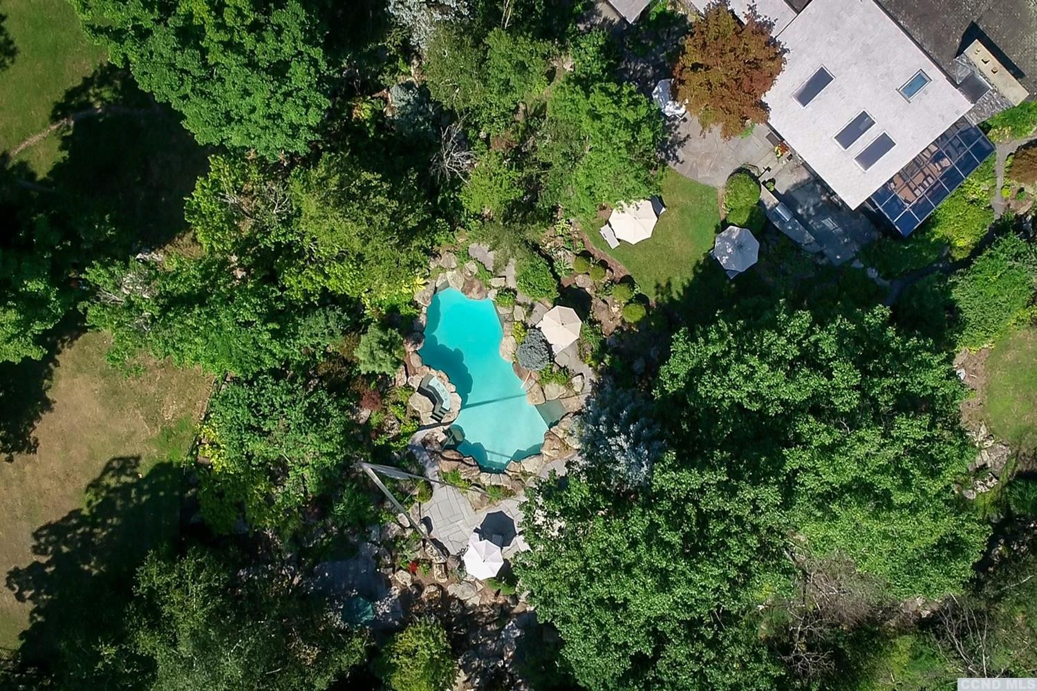181 Golf Course Road Hillsdale, NY 12529 - Photo 7 of 44 an aerial view of a house with a garden and swimming pool