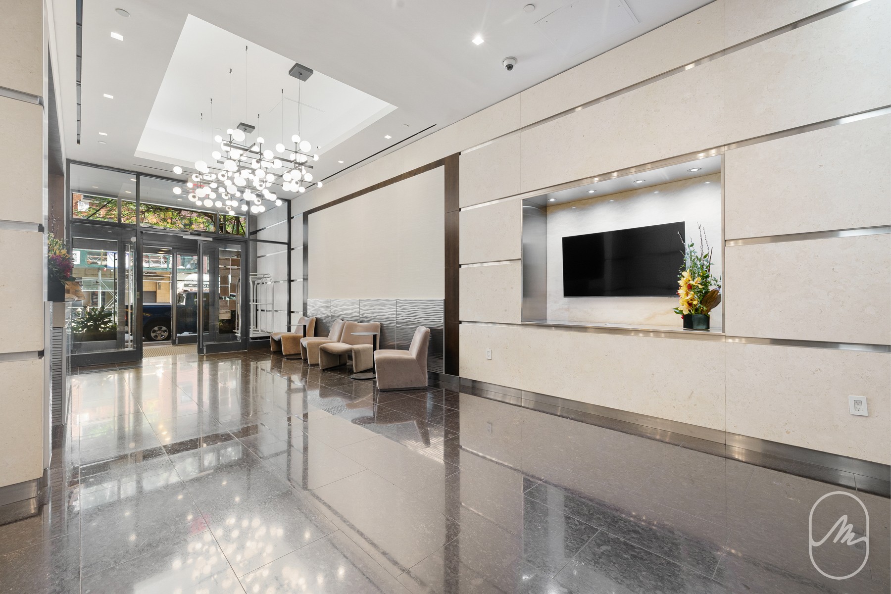 290 3rd Avenue, Unit 28C Manhattan, NY 10010 - Photo 18 of 28 a lobby with furniture and flat screen tv