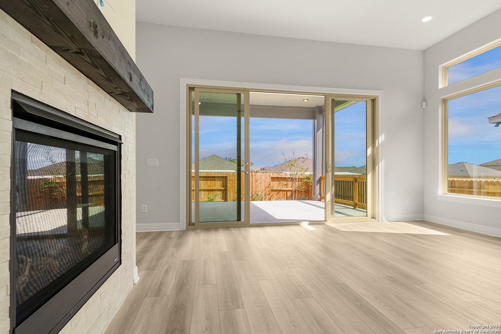 948 Nolte Bend Seguin, TX 78155 - Photo 25 of 39 a view of an empty room with glass door and a window