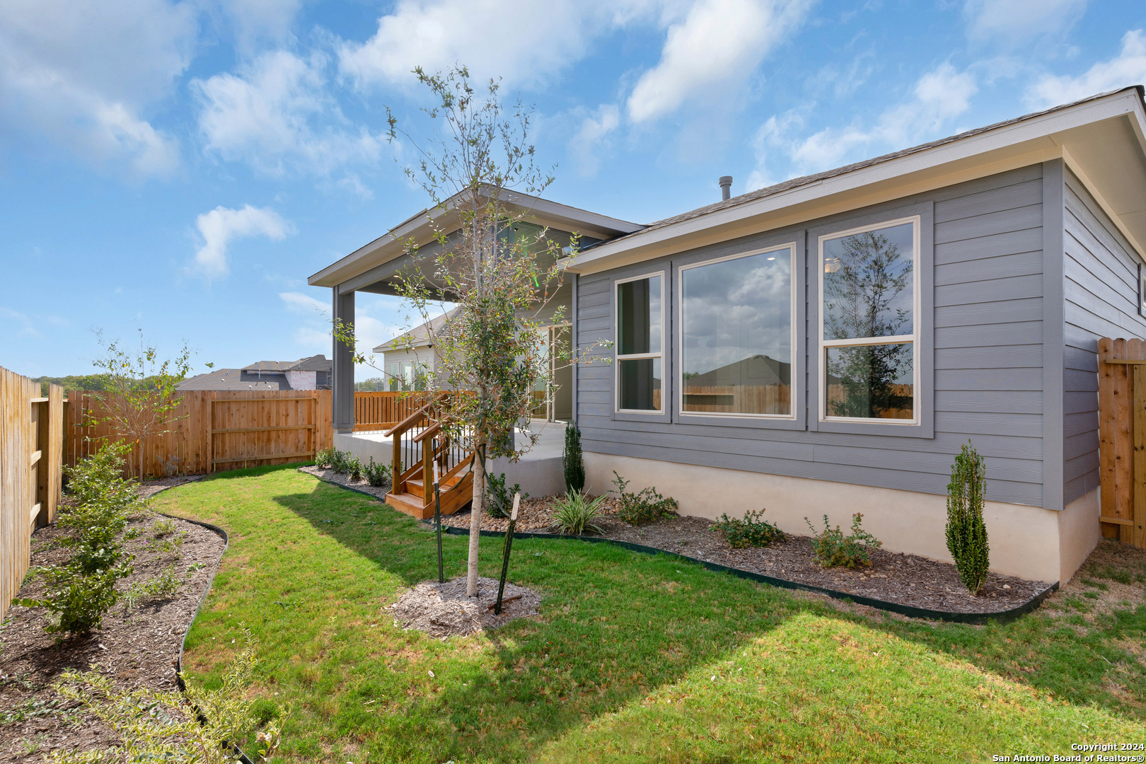 948 Nolte Bend Seguin, TX 78155 - Photo 30 of 39 a front view of a house with garden