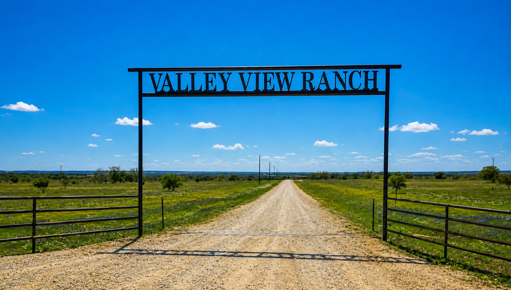 Lot 24 Private Road, Unit 4220 Hamilton, TX 76531 - Photo 2 of 3 Metal archway entrance with custom ranch name, gravel drive, and expansive open fields