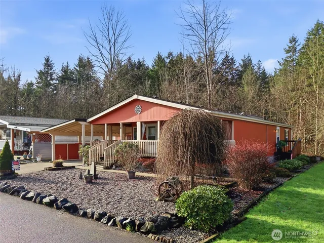 a backyard of a house with lots of green space