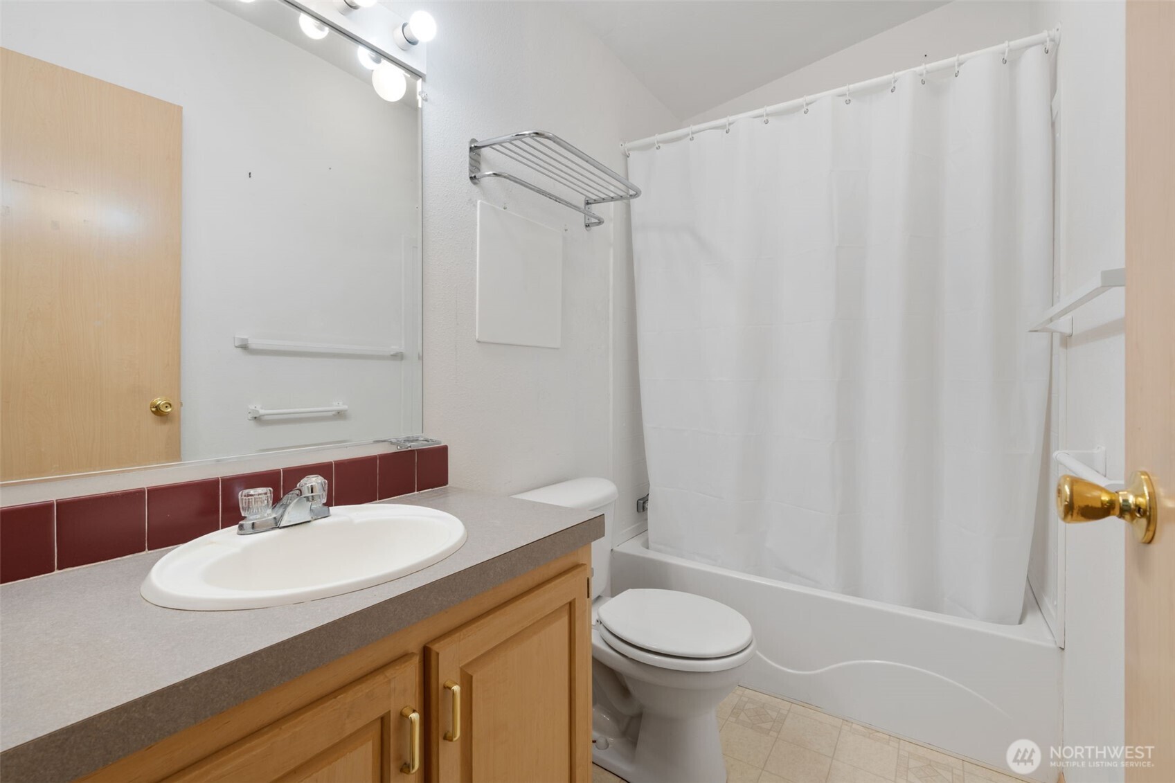 1101 South Scheuber Road, Unit 18 Centralia, WA 98531 - Photo 17 of 28 a bathroom with a sink toilet and shower