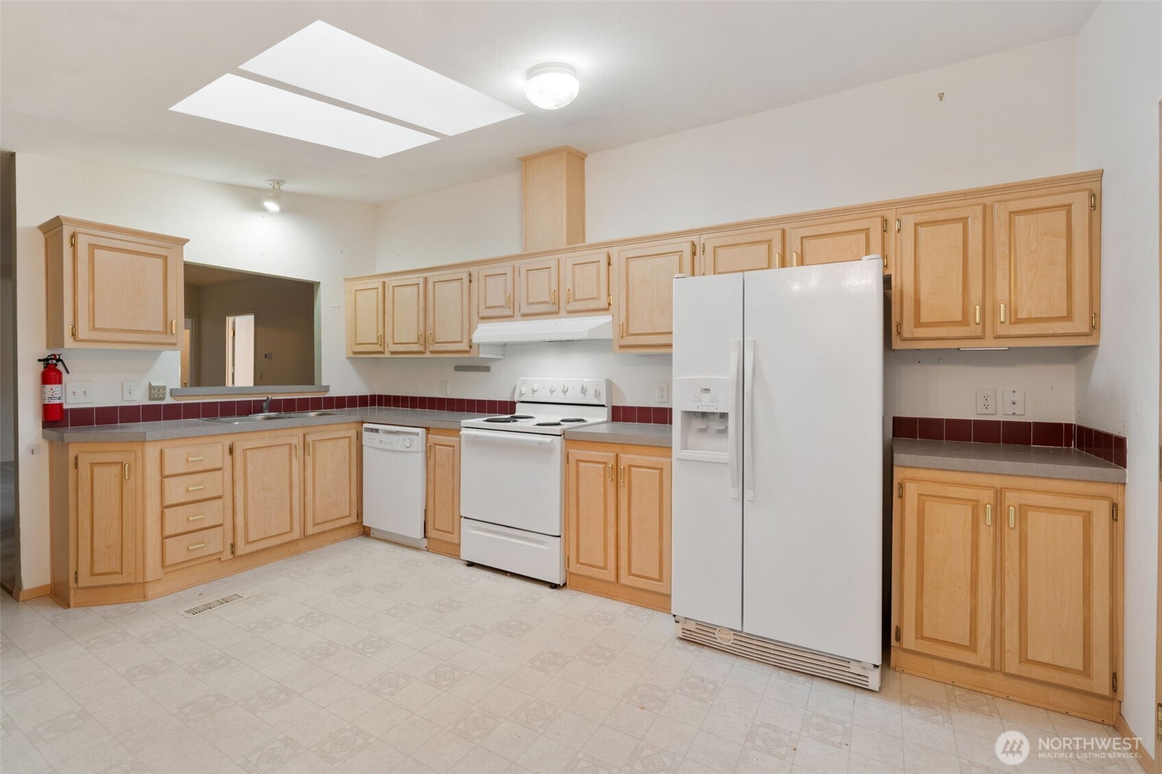 1101 South Scheuber Road, Unit 18 Centralia, WA 98531 - Photo 8 of 28 a kitchen with white cabinets and white appliances