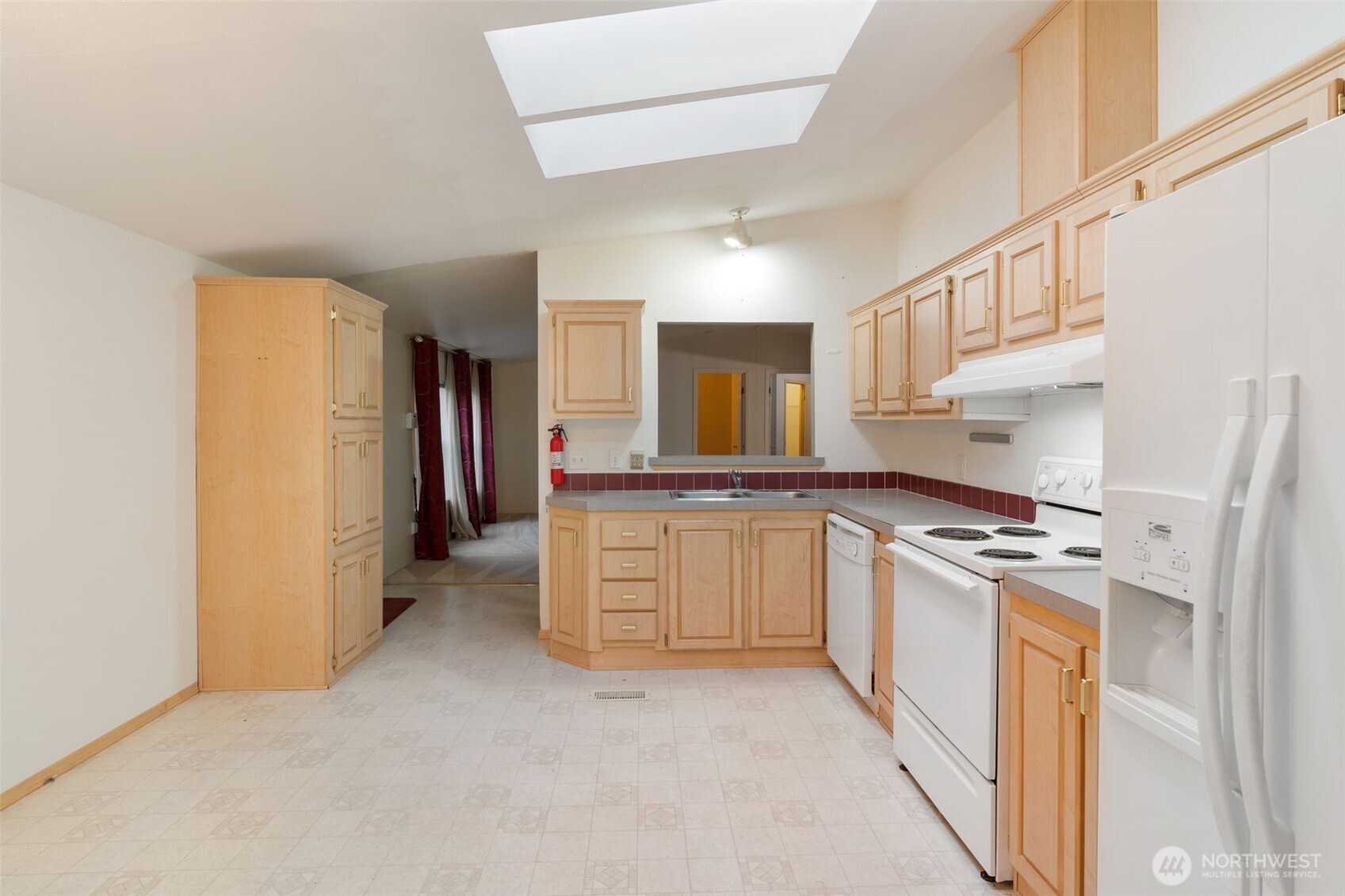 1101 South Scheuber Road, Unit 18 Centralia, WA 98531 - Photo 10 of 28 a kitchen with stainless steel appliances granite countertop a refrigerator and a stove