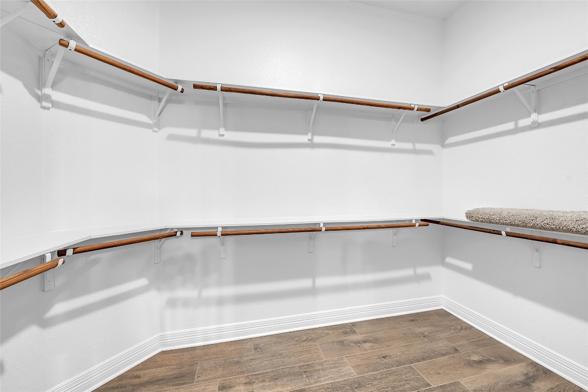 221 Cibolo Ridge Drive Georgetown, TX 78628 - Photo 20 of 27 a view of a room with racks on the wall