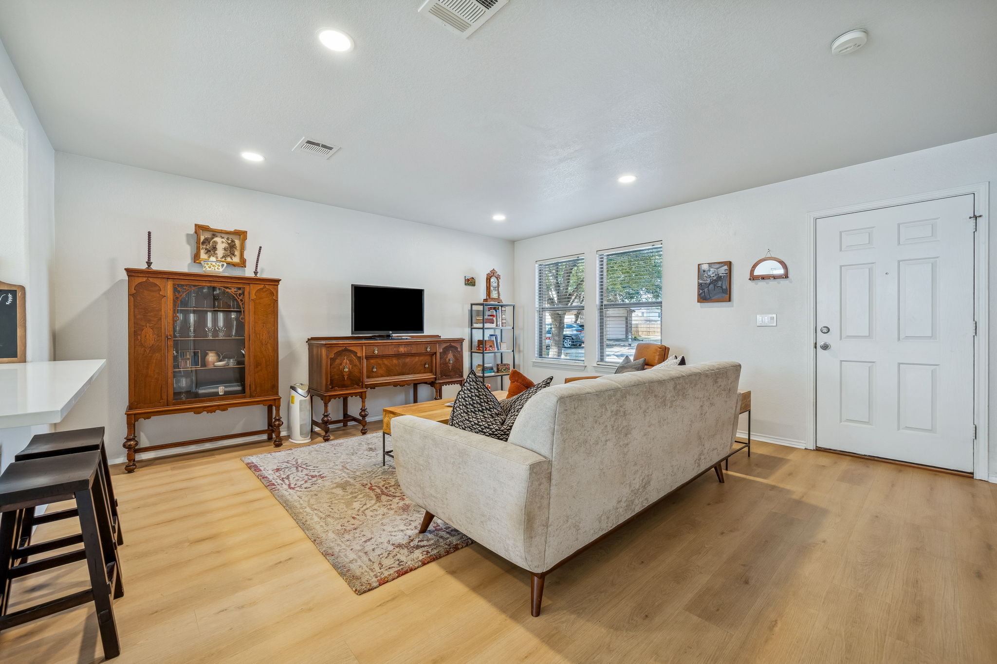 8609 Quinton Cove Austin, TX 78747 - Photo 4 of 40 New laminate-wood-like flooring installed throughout the home.