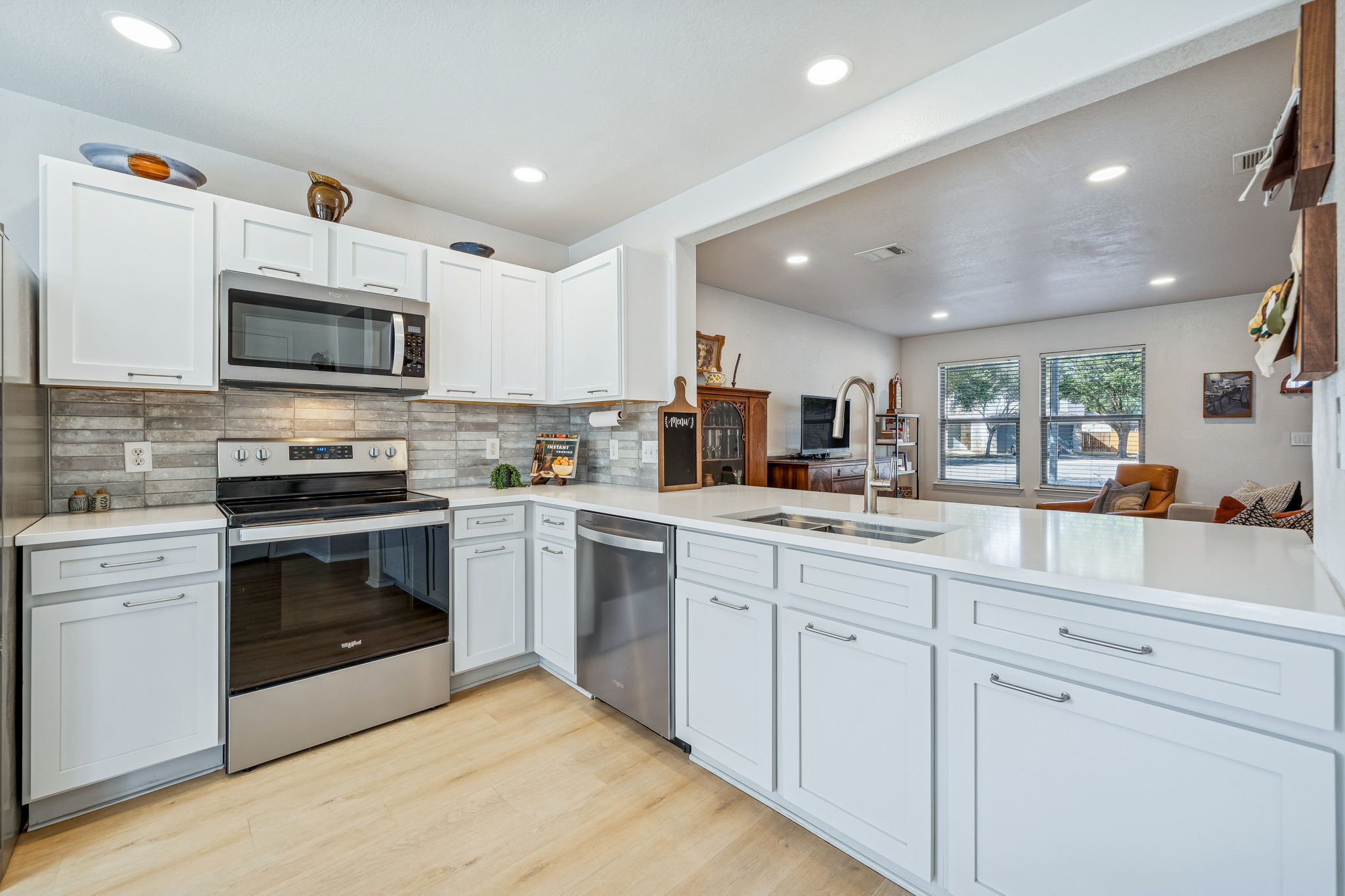 8609 Quinton Cove Austin, TX 78747 - Photo 7 of 40 Updated SS appliances, countertops, sink and backsplash.