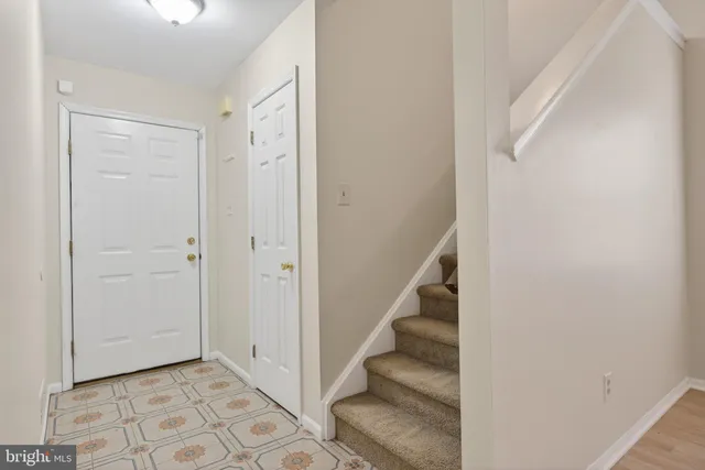 a view of an entryway with staircase