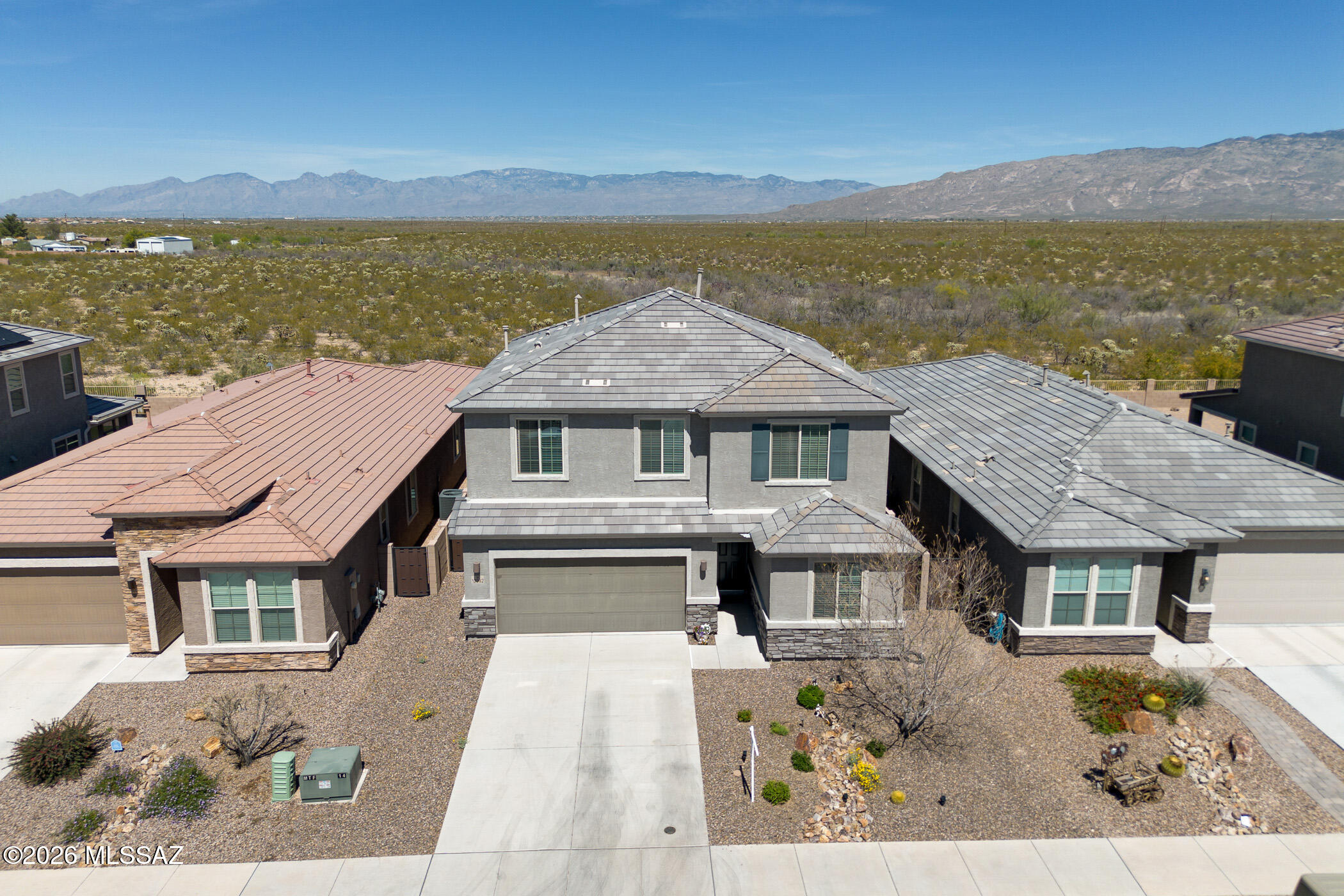 12092 East Ryscott Circle Vail, AZ 85641 - Photo 1 of 49 a front view of a house with a ocean view