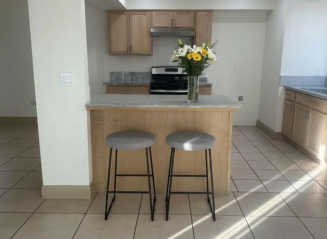 a dining room table chair and fireplace