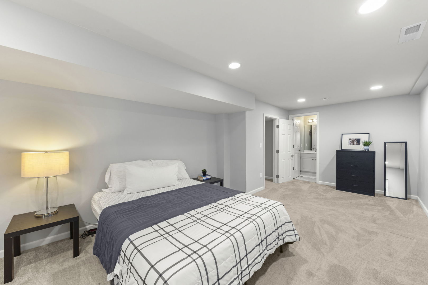 40W210 Palmer Road Geneva, IL 60134 - Photo 25 of 28 a bedroom with a bed and a lamp