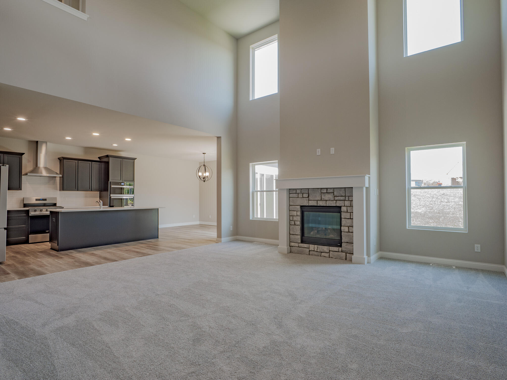3106 Forestside Lane Valparaiso, IN 46385 - Photo 4 of 22 a view of an empty room with a fireplace and a window