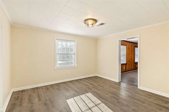 a kitchen with stainless steel appliances granite countertop a stove a sink dishwasher and a refrigerator
