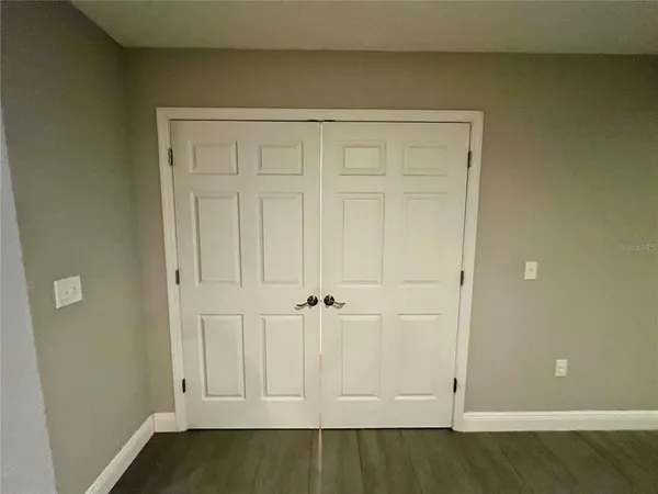 an empty room with an entryway