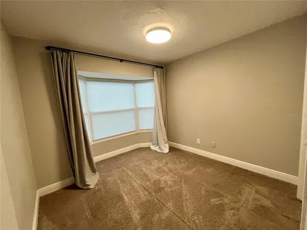 an empty room with a door
