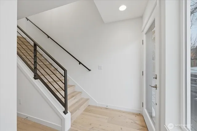 a view of a hallway with staircase