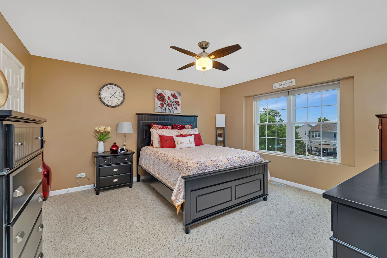 1047 Heron Circle Joliet, IL 60431 - Photo 17 of 25 a bedroom with a bed and a window