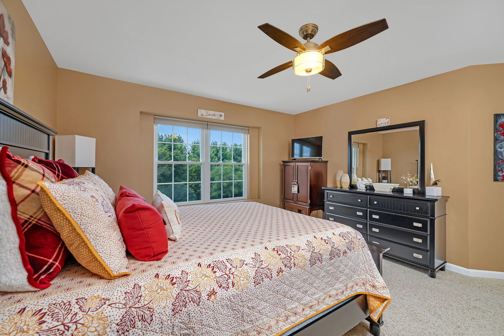 1047 Heron Circle Joliet, IL 60431 - Photo 18 of 25 a bedroom with a bed and wooden floor