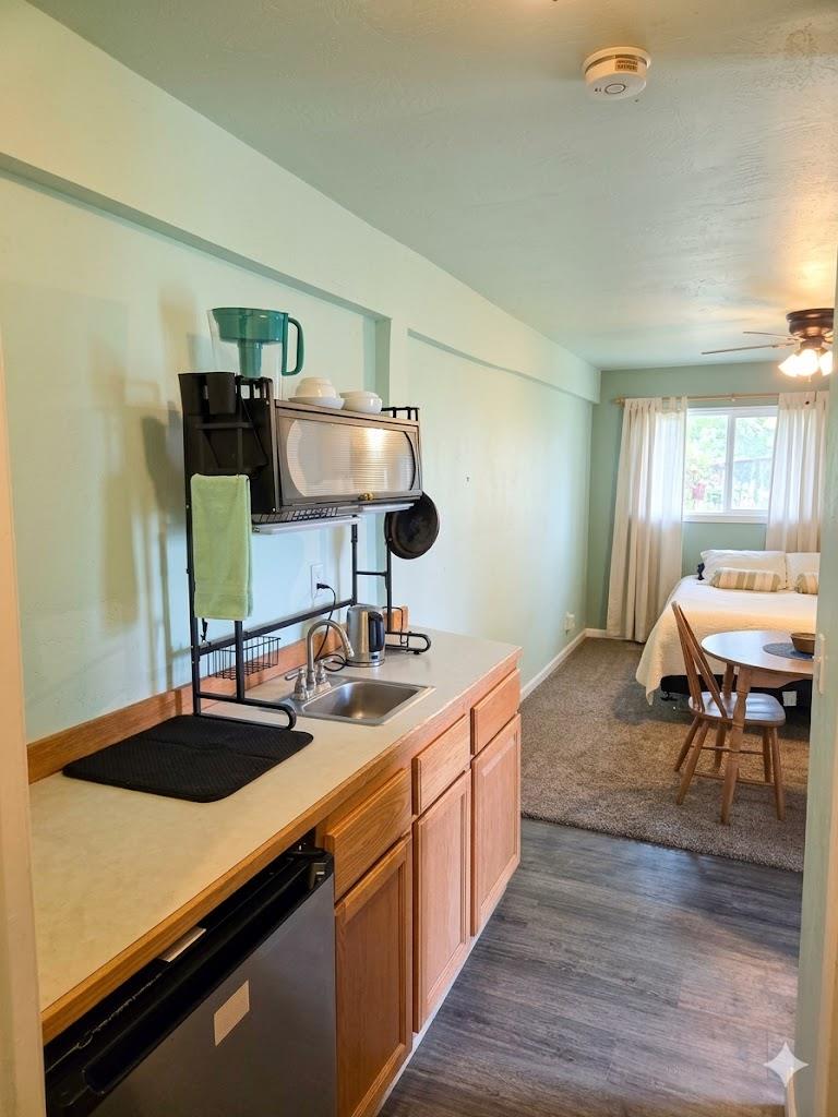 4850 8 Mile Road Camino, CA 95709 - Photo 14 of 30 a kitchen with a sink and cabinets