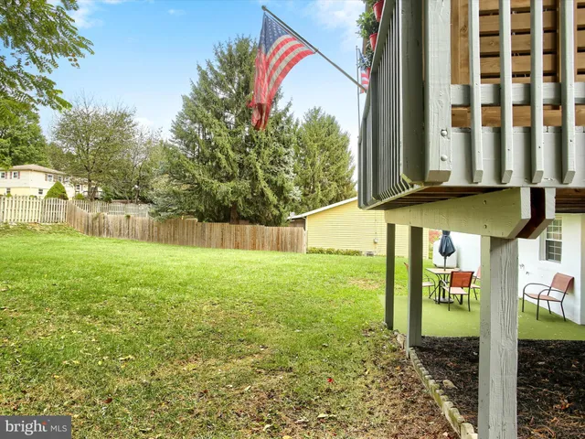 a view of a back yard of the house