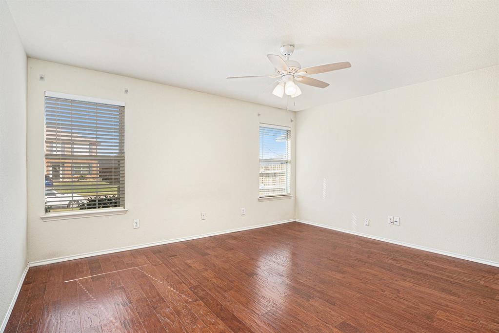 2120 Bliss Road Fort Worth, TX 76177 - Photo 14 of 25 Empty room featuring dark wood-style floors and ceiling fan