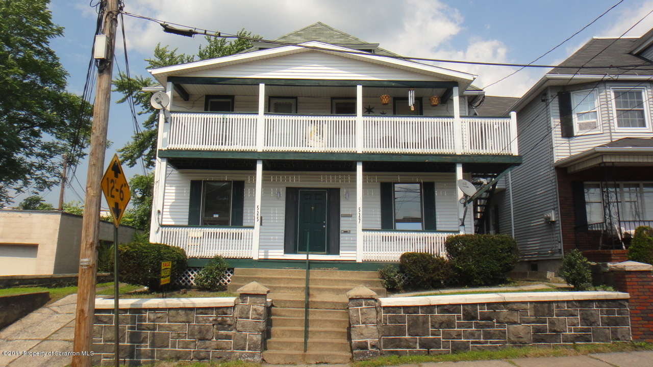 525 Green Ridge Street Scranton, PA 18509 - Photo 1 of 6 a front view of a house with plants