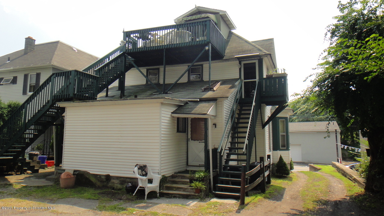 525 Green Ridge Street Scranton, PA 18509 - Photo 6 of 6 a front view of a house with garage