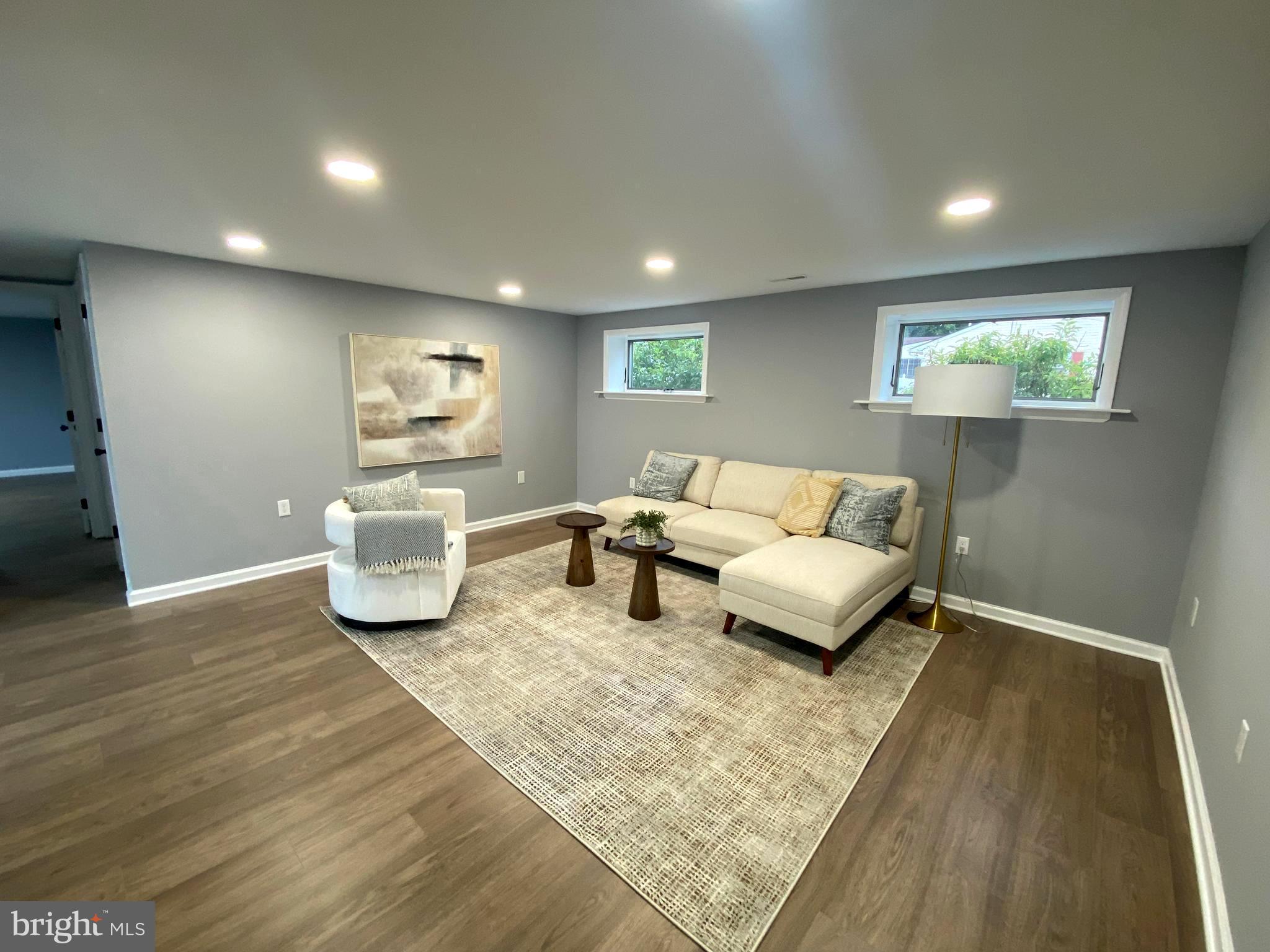 15 East 8th Avenue Pine Hill, NJ 08021 - Photo 12 of 32 a living room with furniture and a rug
