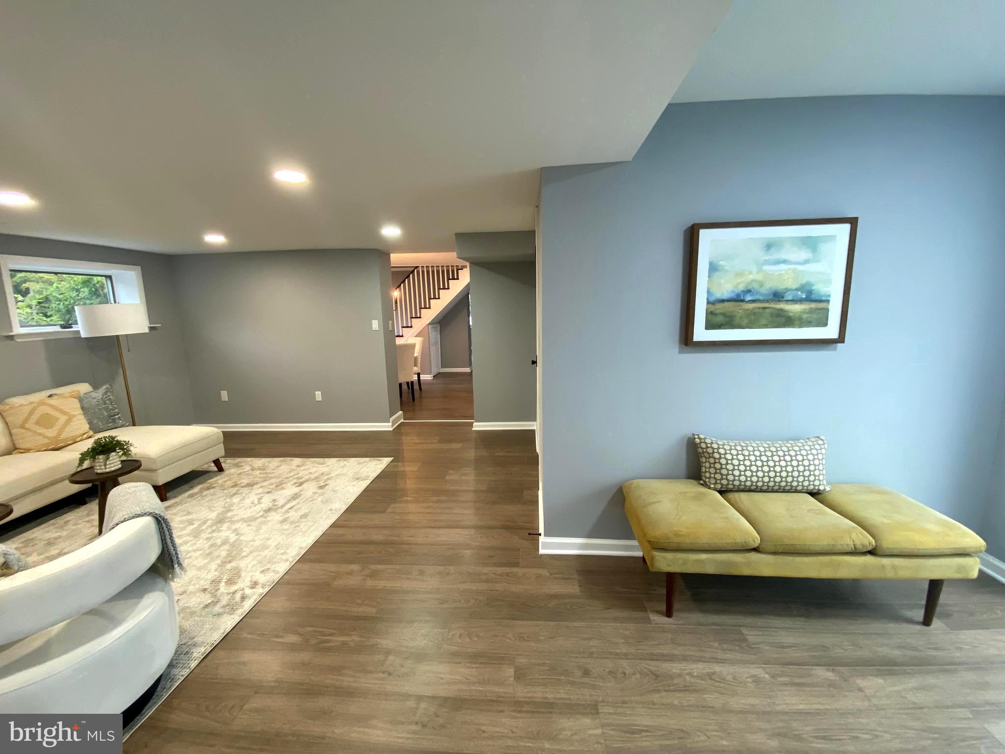 15 East 8th Avenue Pine Hill, NJ 08021 - Photo 14 of 32 a living room with furniture and a rug