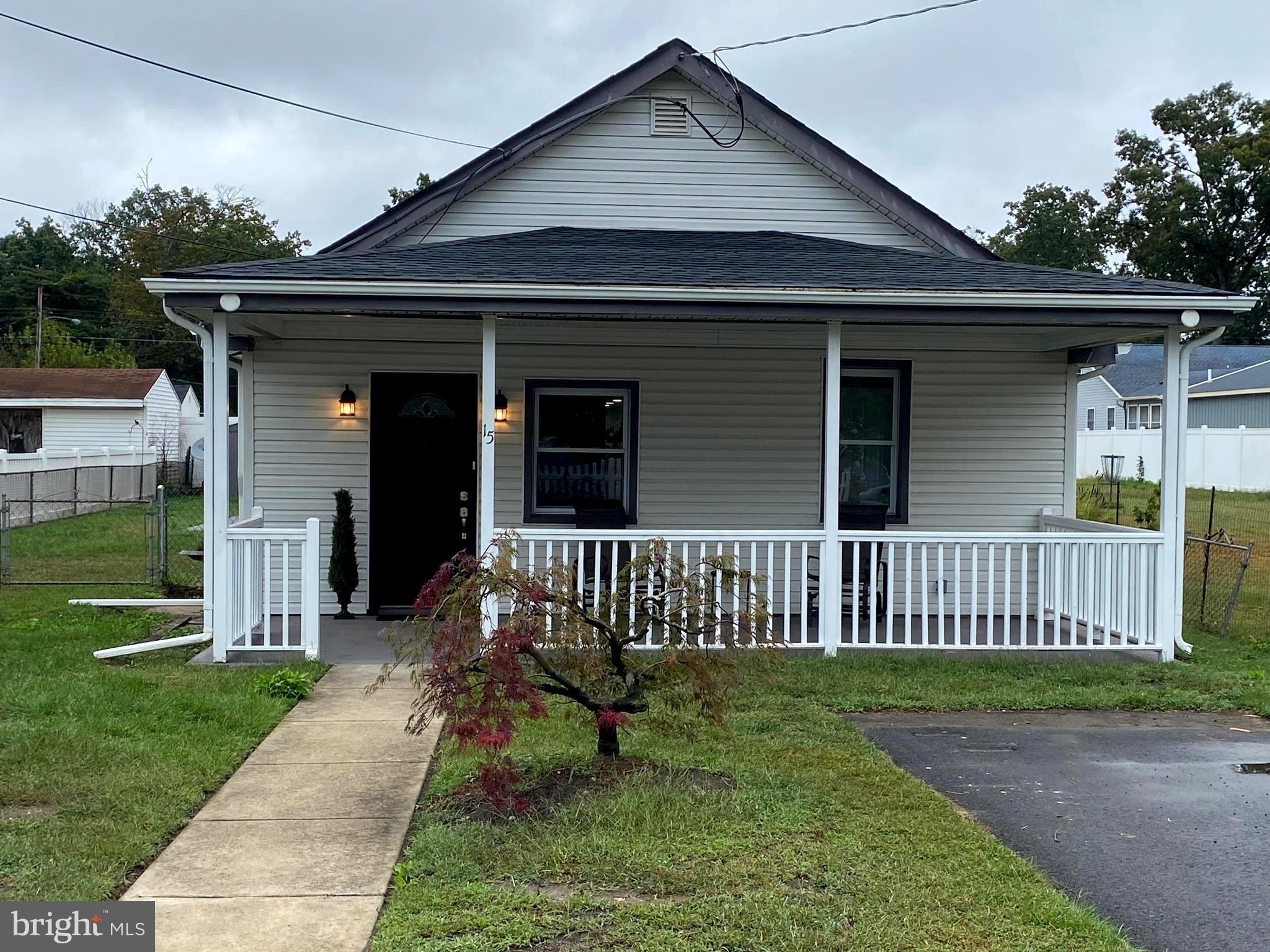 15 East 8th Avenue Pine Hill, NJ 08021 - Photo 2 of 32 a view of a house with a yard