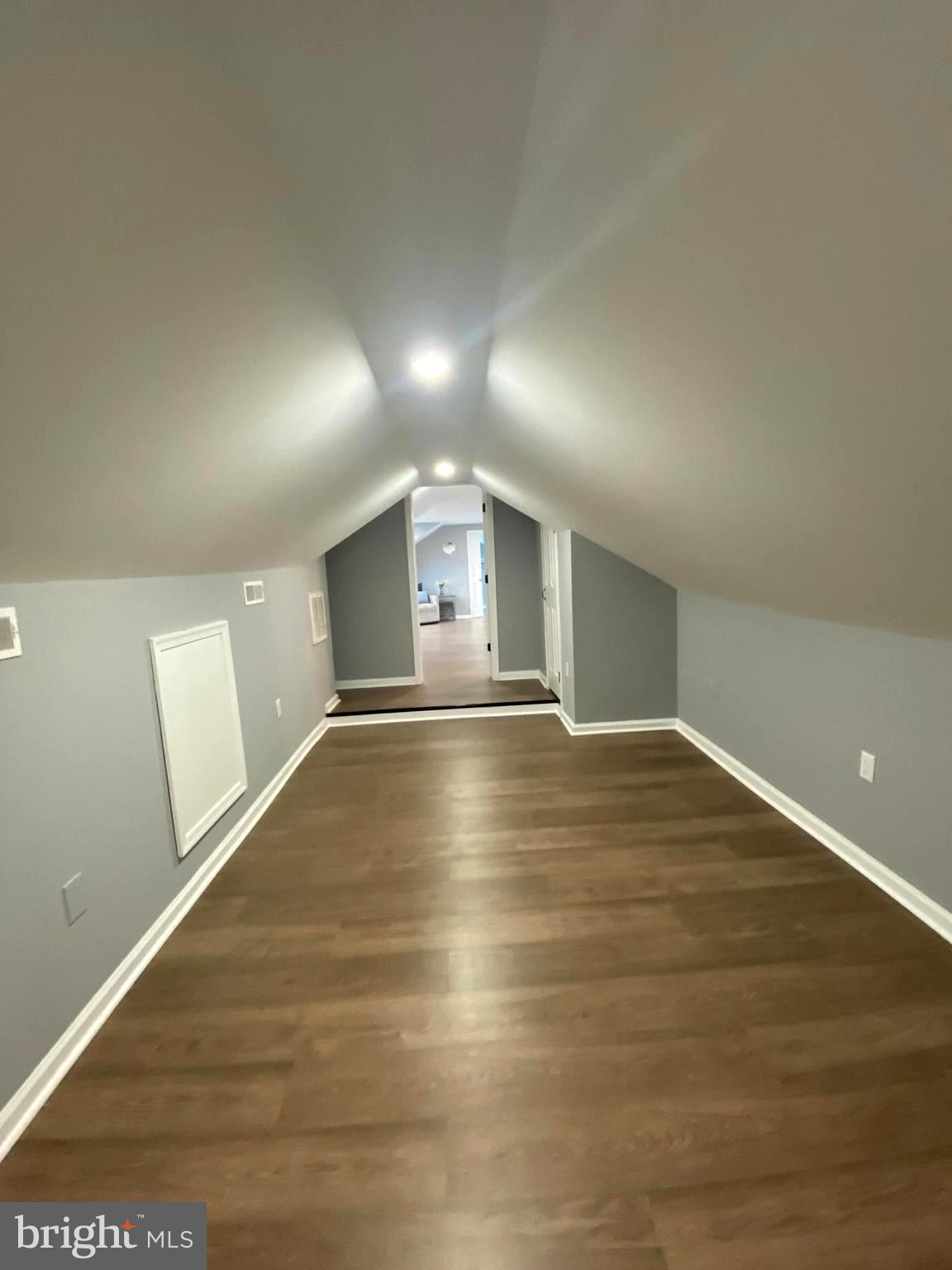15 East 8th Avenue Pine Hill, NJ 08021 - Photo 21 of 32 a view of empty room with wooden floor